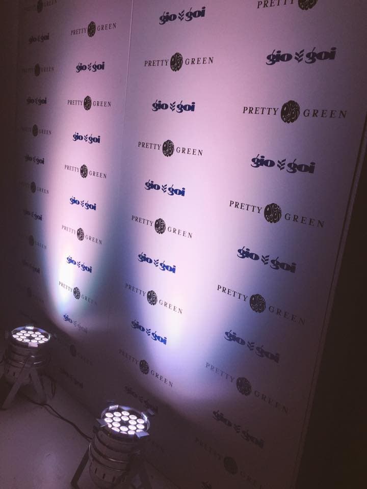 A giogoi and Pretty Green press wall, lit from below